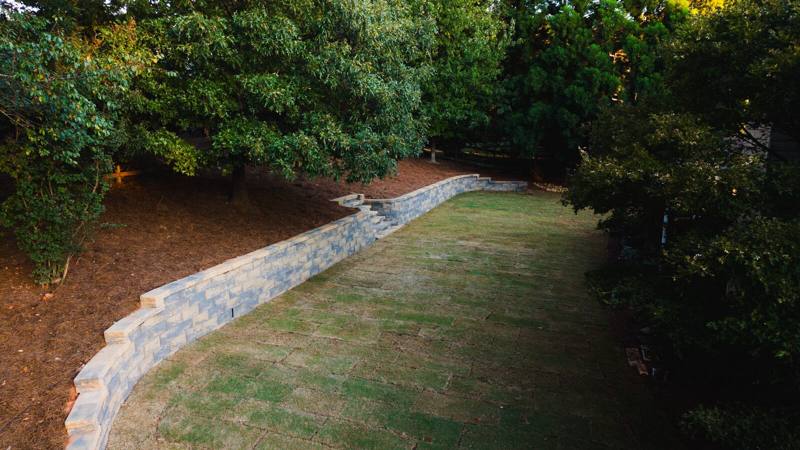 finished 90 ft retaining wall and new sod in Forsyth County GA